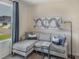 Comfortable living space featuring a plush sectional sofa, stylish decor, and plenty of natural light at 805 Ottawa Dr, Garner, NC 27529