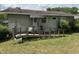 Backyard with a wooden deck and a ramp at 829 Coleman St, Raleigh, NC 27610