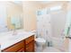 Bathroom showcasing a vanity, toilet, and shower with a whimsical shower curtain at 1003 Southshore Pkwy, Durham, NC 27703