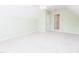 Carpeted bonus room with bright green walls and natural light at 1003 Southshore Pkwy, Durham, NC 27703