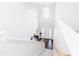 Open foyer with soaring ceilings, decorative window, and hardwood flooring at 1003 Southshore Pkwy, Durham, NC 27703