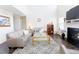 Spacious living room with high ceilings, a fireplace, and comfortable seating at 1003 Southshore Pkwy, Durham, NC 27703