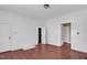 Spacious bedroom with hardwood floors and natural light at 1007 Grace Ave, Burlington, NC 27217