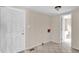 Mud room with white door leading outside at 1007 Grace Ave, Burlington, NC 27217