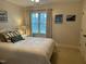 Comfortable bedroom featuring a queen size bed, natural light, and light walls at 1021 Golden Star Way, Wake Forest, NC 27587