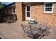 Relax on this back porch with brick siding and plenty of room for chairs and tables at 106 Chariot Dr, Sanford, NC 27330