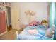 Charming bedroom with unique wallpaper and a whimsical decor at 106 Chariot Dr, Sanford, NC 27330