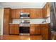 Functional kitchen featuring stainless steel appliances and ample cabinet space at 106 Chariot Dr, Sanford, NC 27330