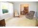Cozy living room with neutral carpet and comfortable seating at 106 Chariot Dr, Sanford, NC 27330