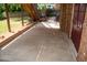 Spacious concrete patio area with stairs leading to the backyard at 106 Chariot Dr, Sanford, NC 27330