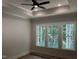 Spacious bedroom with recessed lighting and a ceiling fan with windows providing natural light at 118 Sanderway Dr, Chapel Hill, NC 27516