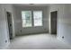 Bright bedroom featuring double windows and ample natural light at 118 Sanderway Dr, Chapel Hill, NC 27516