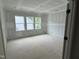 New home bedroom with natural light at 118 Sanderway Dr, Chapel Hill, NC 27516