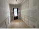 New home entryway with wainscoting at 118 Sanderway Dr, Chapel Hill, NC 27516