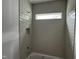 New home shower with tiled walls and a built-in shelf at 118 Sanderway Dr, Chapel Hill, NC 27516