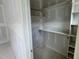Walk-in closet with shelving at 118 Sanderway Dr, Chapel Hill, NC 27516
