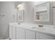 Elegant bathroom with double sink vanity, white countertops, and ample storage at 120 Hatchet Creek Ct Ct, Morrisville, NC 27560