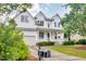 Charming two-story home featuring a welcoming front porch and well-manicured lawn at 120 Hatchet Creek Ct Ct, Morrisville, NC 27560