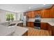 Modern kitchen featuring stainless steel appliances, quartz countertops, and ample cabinet space at 120 Hatchet Creek Ct Ct, Morrisville, NC 27560