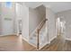 Welcoming foyer with staircase, light colored walls, and hardwood flooring throughout at 120 Hatchet Creek Ct Ct, Morrisville, NC 27560