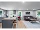 Open-concept living space combines kitchen, dining, and living areas for modern living at 1402 Robinhood Rd, Durham, NC 27701
