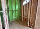 Bathroom under construction, featuring exposed framing and new plumbing at 1521 1/2 Sunrise Ave, Raleigh, NC 27608