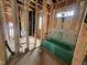 Framed bathroom with green tub at 1523 1/2 Sunrise Ave, Raleigh, NC 27608