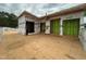 Unfinished exterior showcasing a spacious deck area and the framework of the house under construction at 1523 1/2 Sunrise Ave, Raleigh, NC 27608