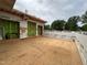 Unfinished exterior showcasing a spacious deck area and the framework of the house under construction at 1523 1/2 Sunrise Ave, Raleigh, NC 27608