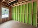 Unfinished interior view showcasing the framework and green sheathing, highlighting the construction phase at 1523 1/2 Sunrise Ave, Raleigh, NC 27608