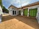 Unfinished patio area with plywood subflooring, framing, and exterior building wrap for weather protection at 1523 Sunrise Ave, Raleigh, NC 27608