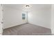 Simple, clean bedroom with natural light from window at 161 Nashua Dr # 2594P, Louisburg, NC 27549