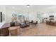 Living room boasts hardwood floors, comfortable seating, and view into the kitchen at 161 Nashua Dr # 2594P, Louisburg, NC 27549