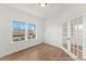 Office with hardwood floors, bright windows, and a set of french doors at 161 Nashua Dr # 2594P, Louisburg, NC 27549