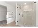 Contemporary shower featuring sleek tile, glass door, and matte black shower head at 161 Nashua Dr # 2594P, Louisburg, NC 27549