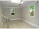Spacious garage ready for customization with painted floors, ample natural light, and an electric door opener at 1610 W B St, Butner, NC 27509