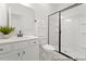Bathroom with a white vanity, dark hardware and a glass shower with a black frame at 169 Nashua Dr # 2590P, Louisburg, NC 27549