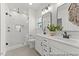 Modern bathroom featuring double vanity, white countertops, and glass enclosed shower at 169 Nashua Dr # 2590P, Louisburg, NC 27549