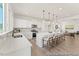 Well-lit kitchen with a large island, modern appliances, and ample counter space at 169 Nashua Dr # 2590P, Louisburg, NC 27549