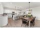 Spacious kitchen and dining area with an open layout and modern finishes at 169 Nashua Dr # 2590P, Louisburg, NC 27549