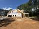 Exterior view of framed new home construction with exterior sheathing and window openings at 194 Landon Ridge, Sanford, NC 27330