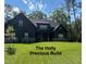 Charming two-story home with a well-manicured lawn and professionally landscaped yard at 194 Landon Ridge, Sanford, NC 27330