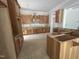 Unfinished kitchen featuring natural wood cabinets and island, ready for customization at 194 Landon Ridge, Sanford, NC 27330