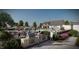 Community outdoor grill area with modern appliances, perfect for barbecues and social gatherings by the pool at 2000 Clydner Dr, Apex, NC 27523