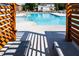 Inviting pool with lounge chairs and sunny spaces to relax in at 2000 Clydner Dr, Apex, NC 27523