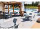 Patio with dining seating outside the community pool house at 2000 Clydner Dr, Apex, NC 27523