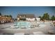 Beautiful community pool area with ample seating and modern design, perfect for relaxation and entertainment at 2000 Clydner Dr, Apex, NC 27523