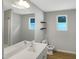 Bathroom featuring a large mirror, modern vanity, and natural light from a window at 2079 Alderman Way, Creedmoor, NC 27522