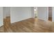 Bedroom featuring new floors, neutral paint, and access to a walk-in closet and en-suite bathroom at 2079 Alderman Way, Creedmoor, NC 27522