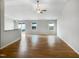 A spacious living room with hardwood floors and ample natural light at 2079 Alderman Way, Creedmoor, NC 27522